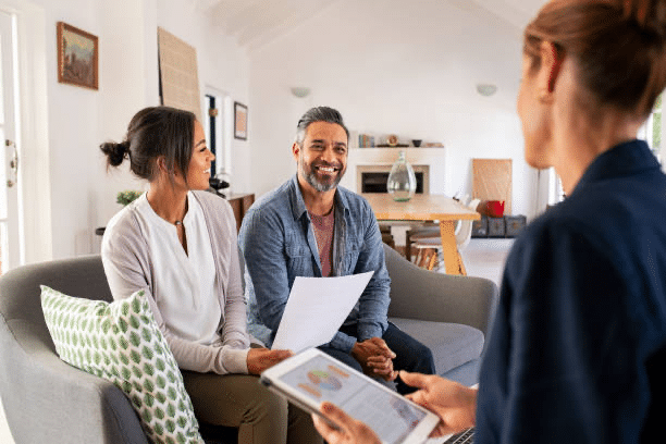 a couple speaking with a consultant