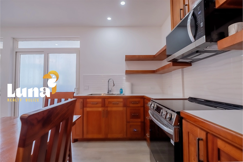 Fully Equipped Kitchen in a 1BR Condo at Ruby Villas
